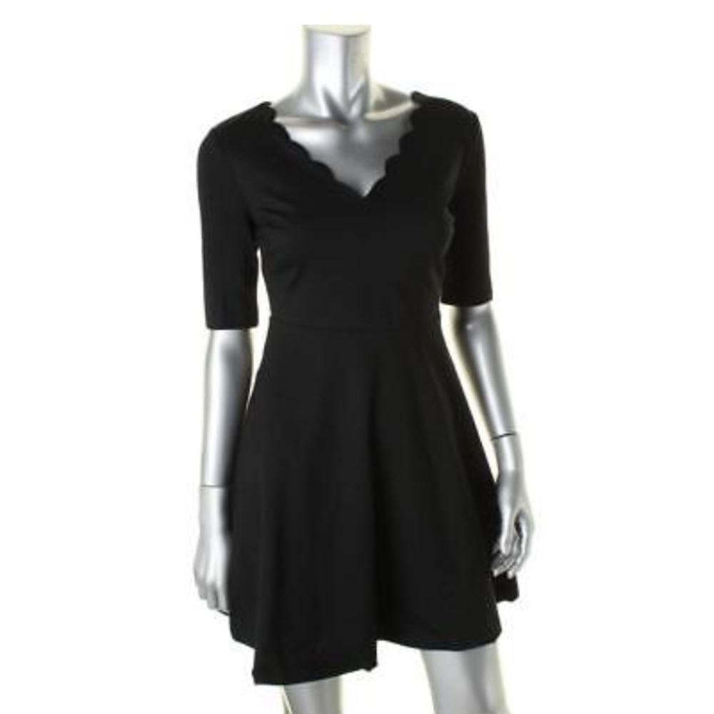 Scalloped black dress